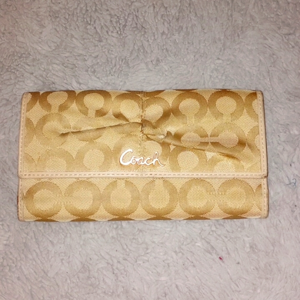 Coach wallet. Large gold plenty of credit card room